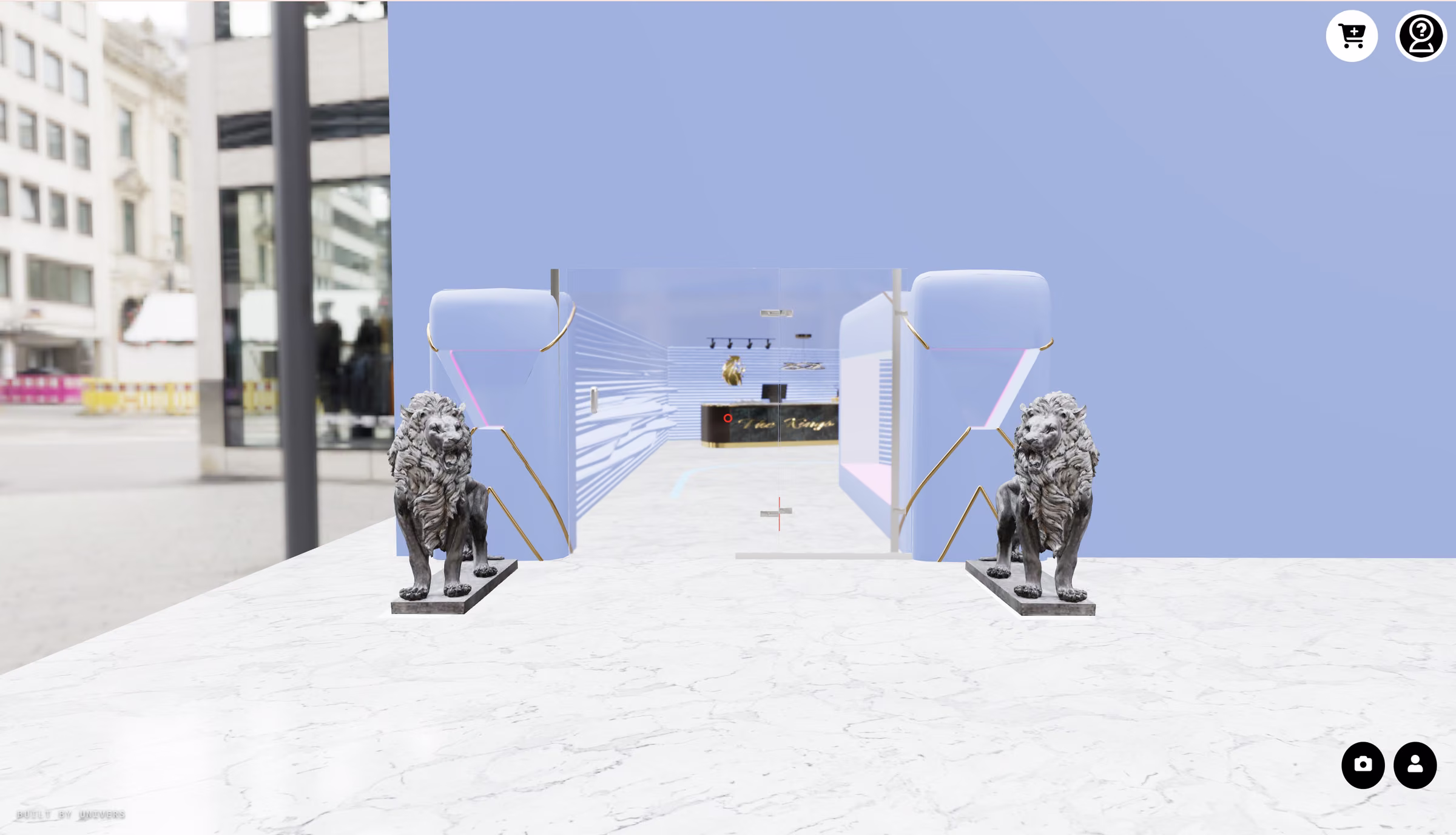 Standing at the entrance of The Kings store, two lion statues flanking open glass doors, the shop floor visible beyond